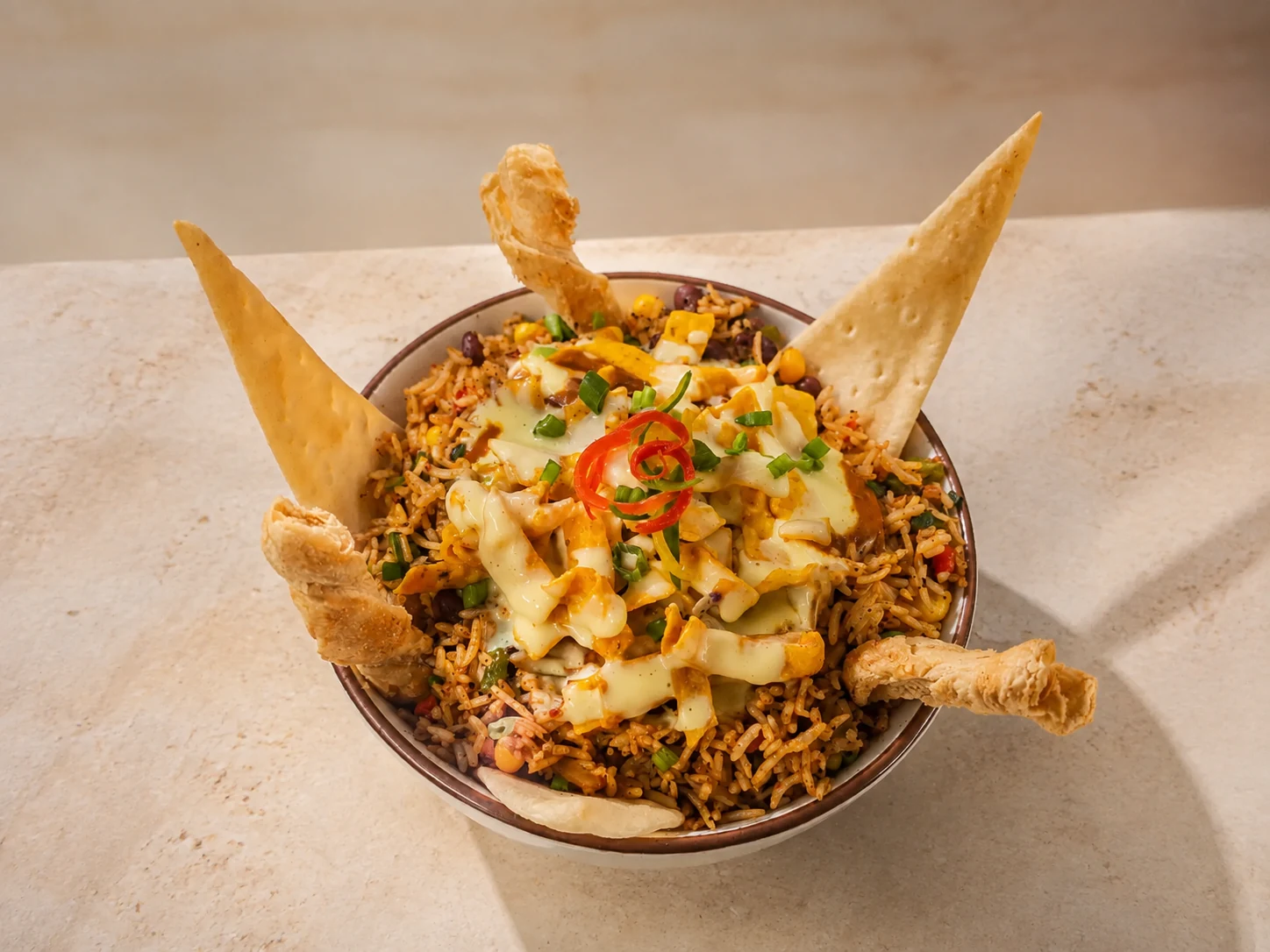 Mexican Hotpot with cheese sauce and crispies